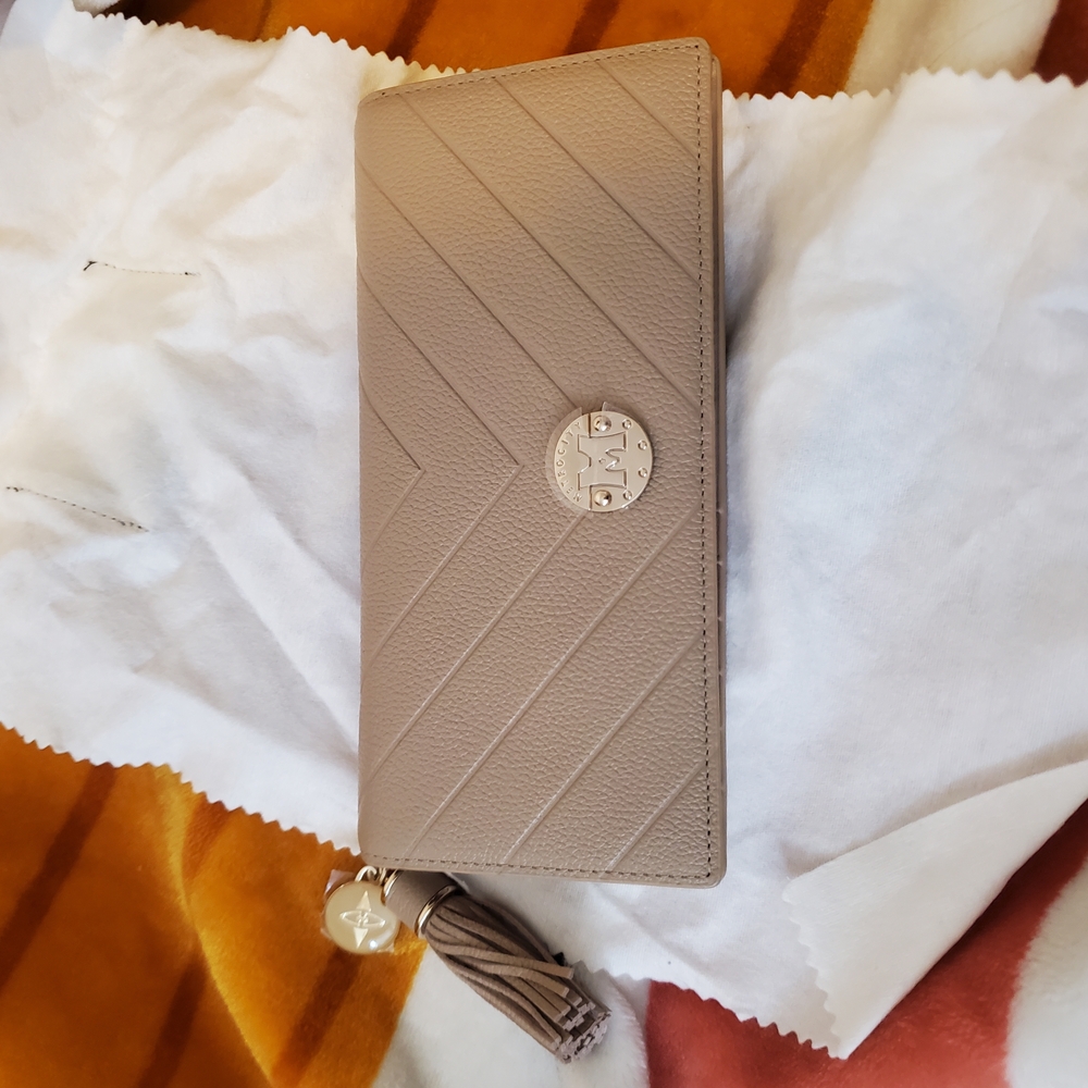 Metro White Cream Quilted Clutch with Tassel
